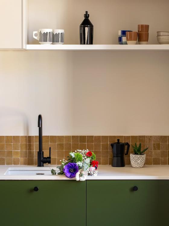 Olive and Ivoire kitchen with zellige splashback